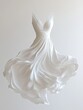 © irina - Elegant white dress gracefully suspended in mid-air, showcasing flowing fabric and a sophisticated silhouette, ideal for a formal occasion or bridal wear