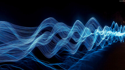Wall Mural - abstract blue light trails creating wavy pattern on black background