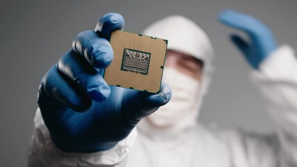 Engineer removes protective gear after completing the development of a processor, looking satisfied with the work, set against a bright background, symbolizing innovation and achievement.