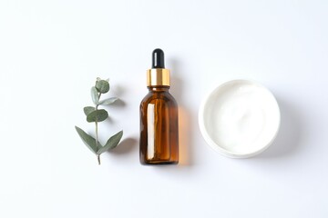 Skin care with cosmetic essential oil in a glass bottle and moisturizing cream. Dry skin care products