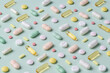 © Marc Tran/Stocksy - Colorful Assortment of Various Pills on Mint Background