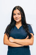 © VICTOR TORRES/Stocksy - Confident Healthcare Professional Posing in Professional Attire