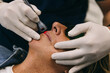 © VICTOR TORRES/Stocksy - Dental Laser Procedure in a Modern Clinic Setting