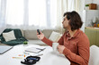 © LIGHTFIELD STUDIOS - Young man managing diabetes in a modern apartment through daily routines and rituals