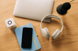 © Olga Moreira/Stocksy - Close up of podcast recording essentials on wooden desk