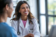 © Nedrofly - Doctor consulting with patient in bright office setting