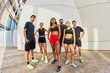 © Javier Díez/Stocksy - Confident and diverse athletes ready for fitness training
