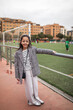 © Lupe Rodriguez/Stocksy - girl on a soccer field watching the game