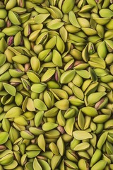 Sticker - A pile of pistachios stacked on top of each other for display or sale