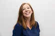 © VICTOR TORRES/Stocksy - Smiling Healthcare Professional in Blue Uniform