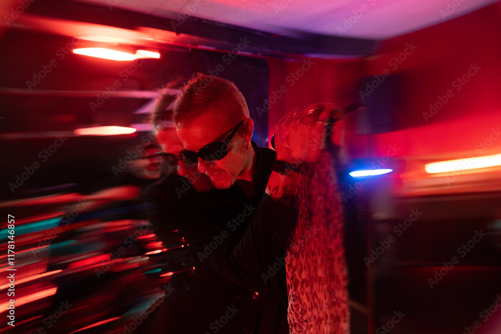 Dynamic band performance in vibrant red club setting