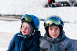 © Irina Polonina/Stocksy - Two Young Boys Enjoying a Snowy Winter Day