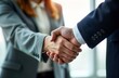 © Pete - Business people shaking hands in office. Partners trust and cooperation. Future commercial goals. Successful deal and agreement. Pro and corporate environment. Formal meeting or negotiation.