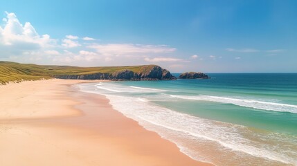 Sandy beach with turquoise water and cliffs under a sunny sky.