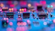 © Babycrab - Close-up of electronic circuit board with integrated circuits and colorful bokeh background.