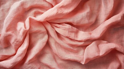 Leinwandbilder - Close-up of soft, peach-colored fabric with wrinkles and folds, creating a textured background.