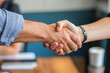 © Kavidu - Closeup of Professional Handshake in Office Showing Business Deal and Corporate Partnership