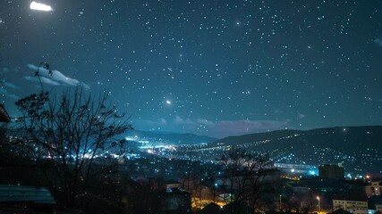 Wall Mural - the starry sky above the night city time lapse seamless looping overlay 4k virtual video animation background