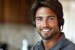© SY - Smiling man wearing a headset, providing excellent customer service. Perfect for websites, blogs, or articles about customer support and communication.