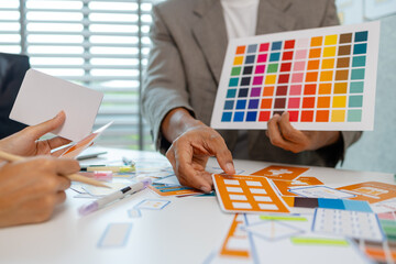 UX graphic designer planning application process development prototype, software development team, copy space, collaboration UX developer and UI designer, team analyzing mobile app interface