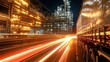 © stockagency - Nighttime industrial scene with a truck and illuminated factory.