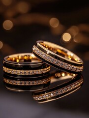 Canvas Print - Gold wedding rings with diamonds on black background