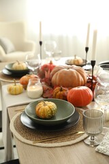 Wall Mural - Stylish table setting with beautiful autumn decor in dining room