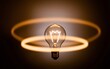 © BackgroundStudio - illuminated light bulb, Glowing lightbulb with halo, idea concept.
