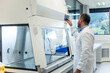 © EDER - Scientist working with a fume hood in a scientific laboratory