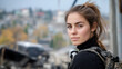 © Ari - Canadian special force woman in tactical gear at ruins of buildings in conflict area