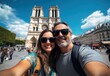 © Bambalino Studio - A man and woman are smiling for the camera in front of a large cathedral. The man is wearing a backpack and sunglasses, while the woman is wearing a floral dress. The scene is lively and cheerful