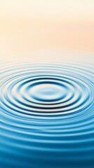 Poster - Concentric ripples expanding outwards on a water surface after a droplet impact, creating a mesmerizing pattern with reflections of light in a tranquil and meditative scene