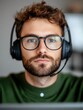 © AI_Imaginator - Focused young man wearing headset
