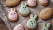 © Truprint - Easter cookies decorated with pastel icing in the shape of bunnies and eggs arranged on a baking tray in natural light