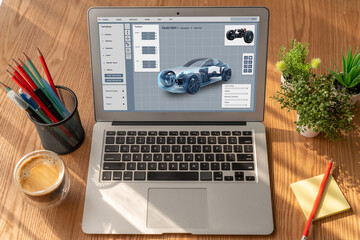 electric car design software on computer screen showing simulation blueprint snugly by digital calcu