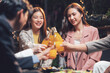 © Kritdanai - Friends Celebrate with Toast:  A group of friends raise their glasses in a joyful toast, capturing the essence of friendship and celebration.