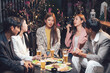 © Kritdanai - After Work Drinks: A group of young professionals unwind and connect over drinks and conversation, creating a relaxed and inviting atmosphere.