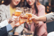 © Kritdanai - Cheers to Success: Friends raise a toast, celebrating a shared moment of joy and camaraderie in a warm, inviting setting.  The image captures the essence of friendship and good times.