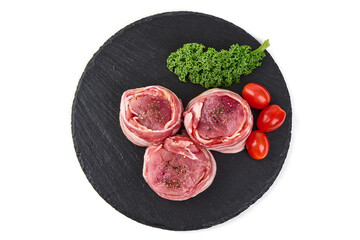 Wall Mural - Raw bacon-wrapped meat medallions with seasoning, isolated on white background.