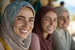 © Jenny - Smiling young caucasian women in colorful hijabs enjoying time together