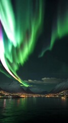 Wall Mural - tromso aurora northern norway sky borealis lights blue landscape nature cloud abstract light mountain sea sun water night sunrise space sunset ocean dark beauty star underwater arctic astronomy