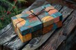 © juliars - Festive gift box resting on weathered wooden surface, evoking a sense of anticipation and holiday spirit