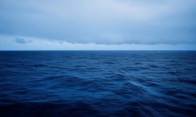 Wall Mural - Dark blue ocean surface seen from underwater