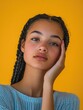 © Goncharenko - Young woman with braids