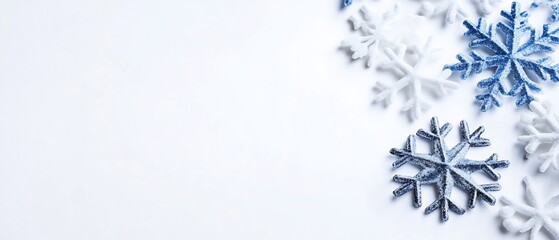 Wall Mural - A collection of decorative snowflakes on a white background.