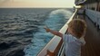© VK Studio - A curious child gazes at the vast ocean from a ship's deck, symbolizing a sense of wonder and exploration in the open sea's embrace.