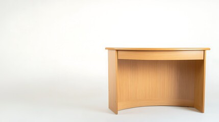 Wall Mural - A wooden desk with a curved top sits on a white background