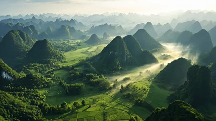 Wall Mural - Misty Sunrise over Karst Mountains in Vietnam