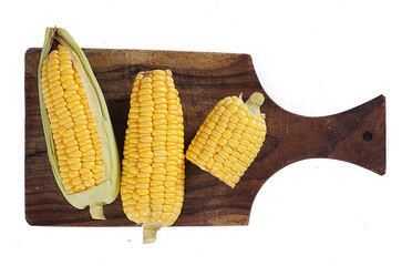 Top view set of corn on wooden cutting board isolated on transparent background