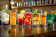 © md - Colorful and vibrant collection of colorful cocktails with various garnishes in glasses on bar counter